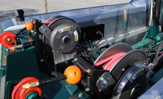 image of the optional retractable air line reels located on the back of the century 9055xl