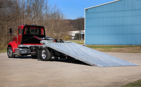 This image shows a rear view of the Century 12-Series LCG car carrier outfitted with a galvanized deck and subframe.