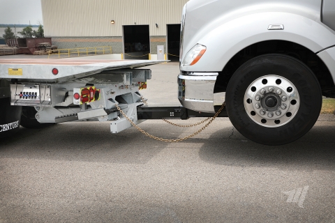 Image showing heavy-duty underlift for industrial carriers being used for towing.