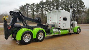 Image of a Holmes DTU installed on the back of a road tractor with a wet line kit.