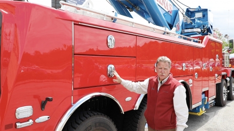 John Hawkins of Miller Industries showing the tool box options on the Century M100