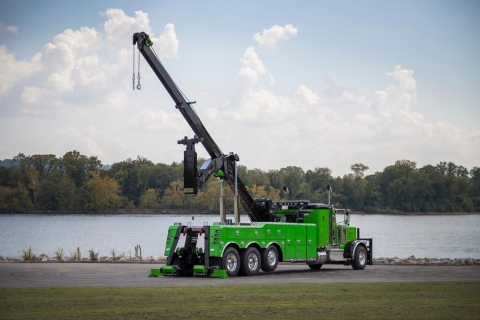 Rear view of a Century 9055 all stretched out with the recovery boom fully extended and elevated