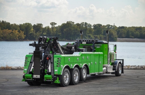 Rear view of a neon green Century 9055 in the stowed position