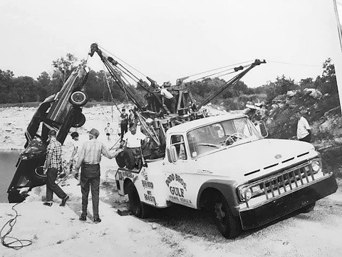 Photo of a Holmes 330 Junior in action recovering a car from a ditch