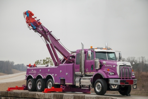 a century 1150 rotator all stretched out on the podium at Miller Industries