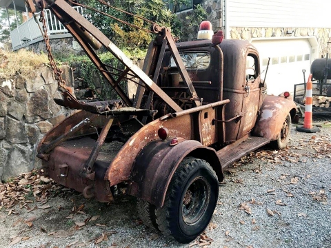 Images of a rusted out old Holmes 330 Junior wrecker before it was restored